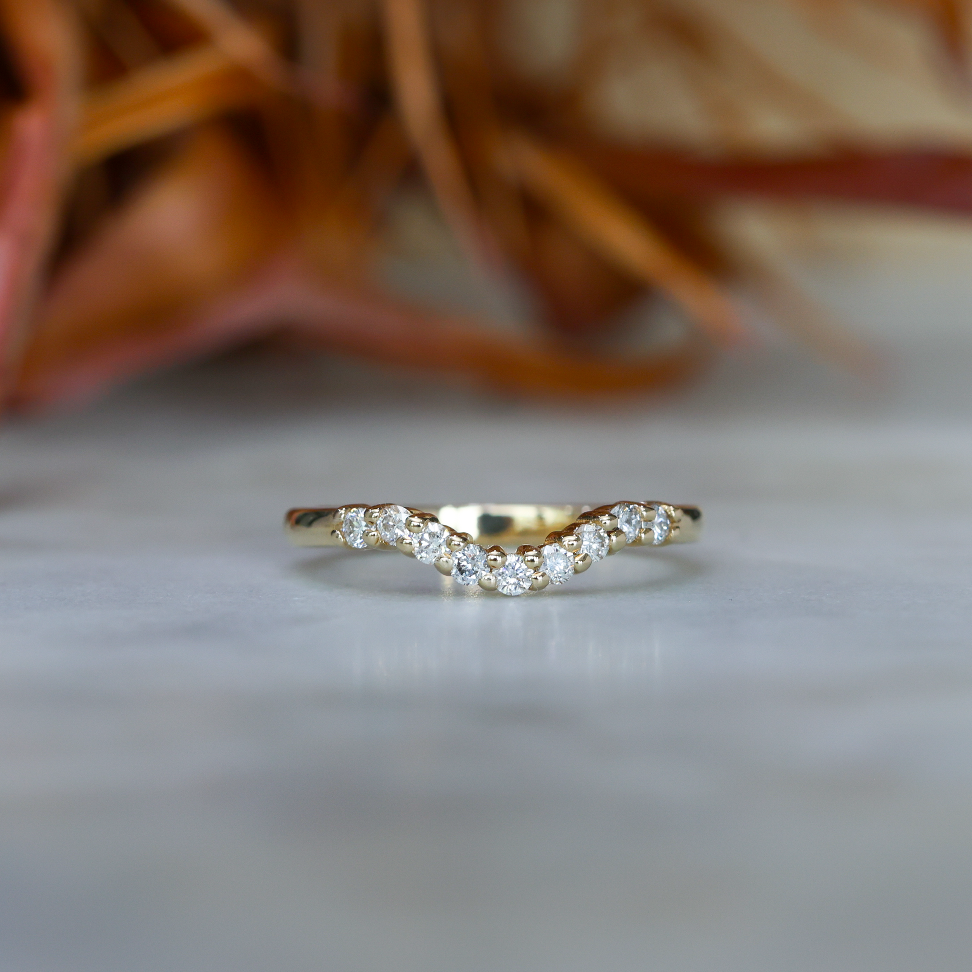 curved diamond wedding band