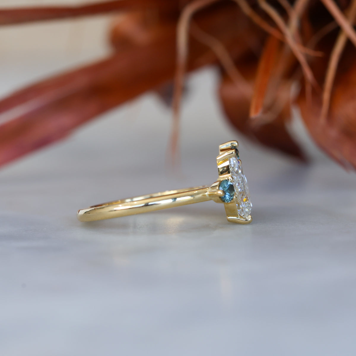 DELILAH | DIAMOND & MONTANA SAPPHIRE CLUSTER ENGAGEMENT RING