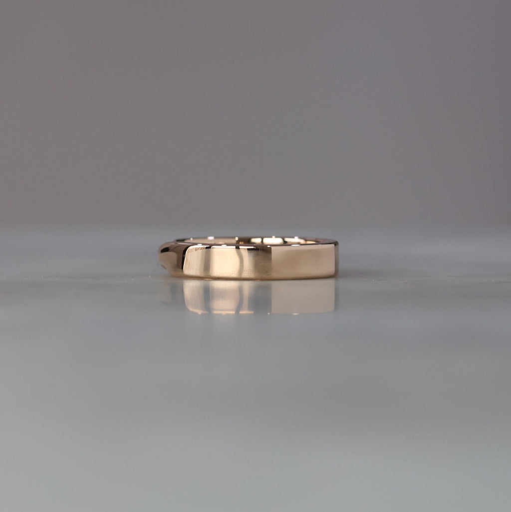 gold mobius twist wedding band back