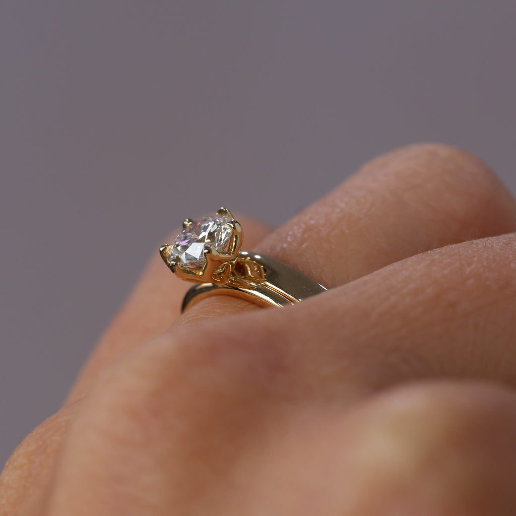 gold mobius twist wedding band with engagement ring profile