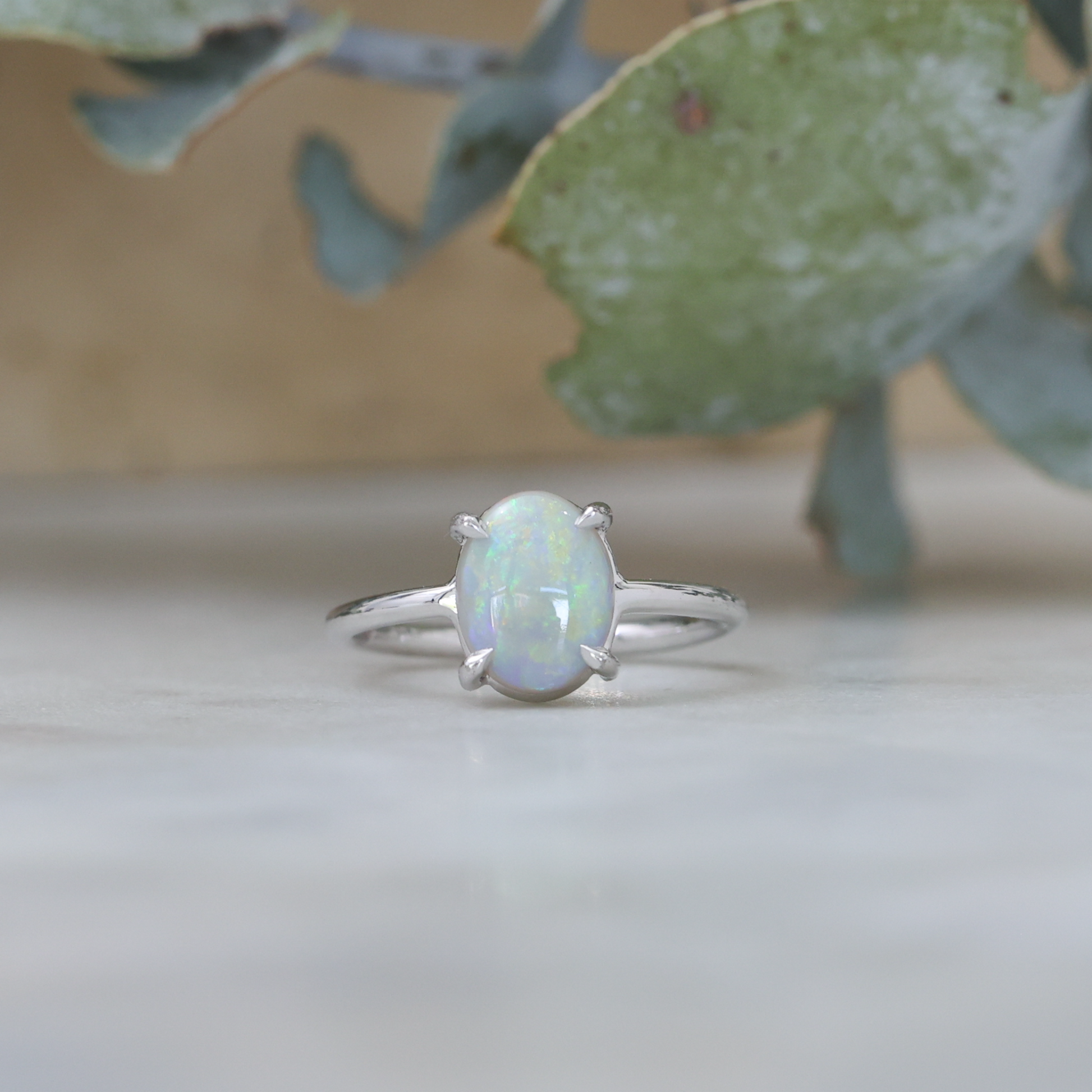 oval opal ring in white gold