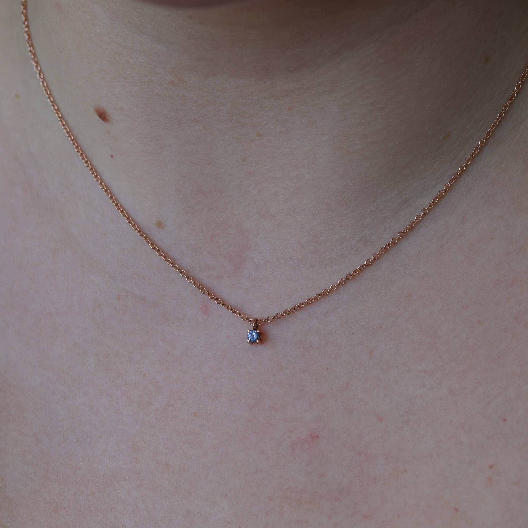 petite montana sapphire necklace on neck