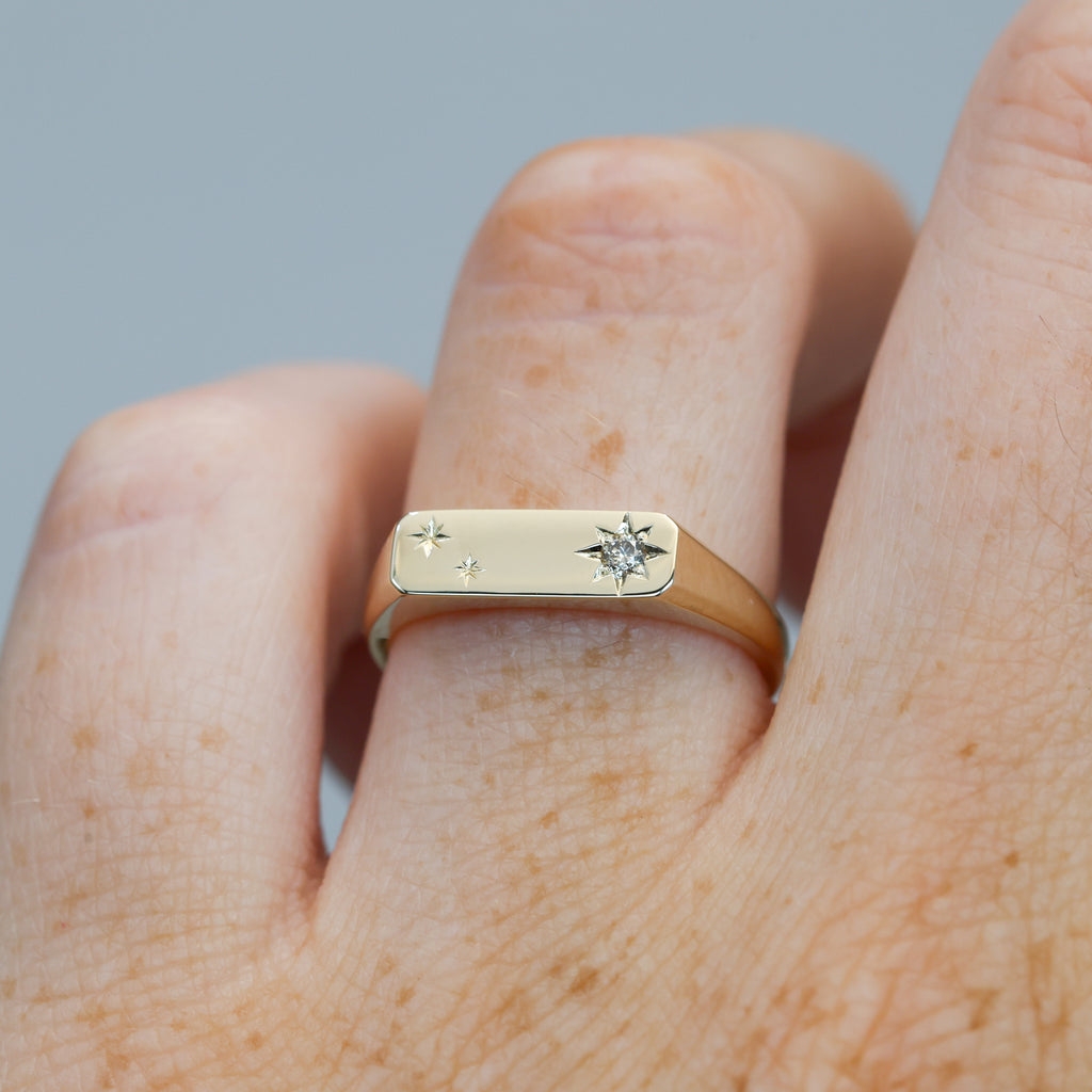 two star and champagne diamond bar signet ring