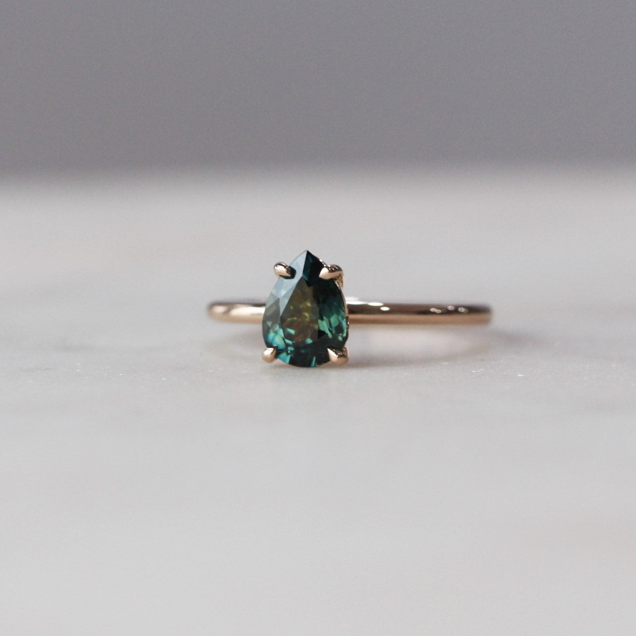 PEAR / SAPPHIRE SOLITAIRE RING