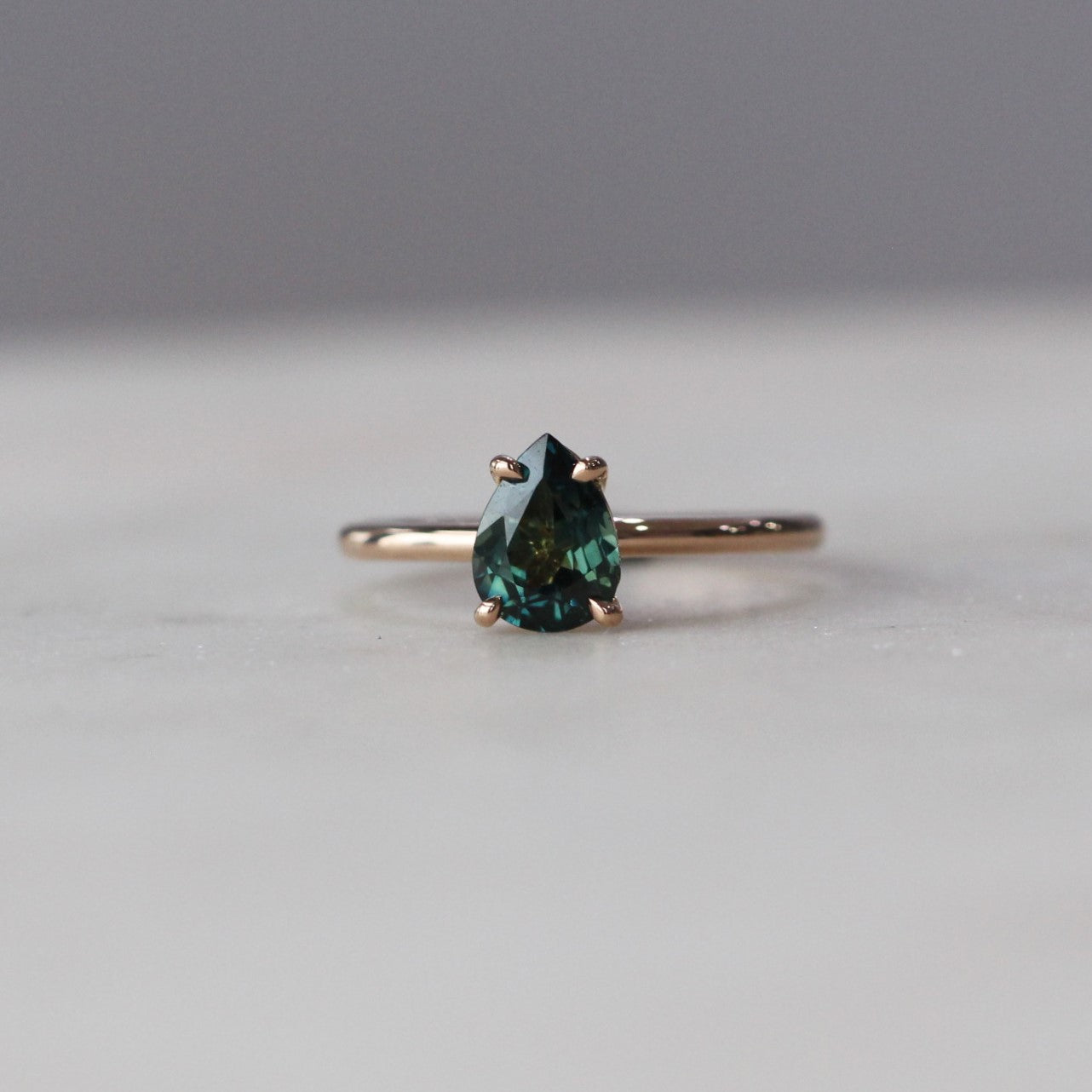 PEAR / SAPPHIRE SOLITAIRE RING