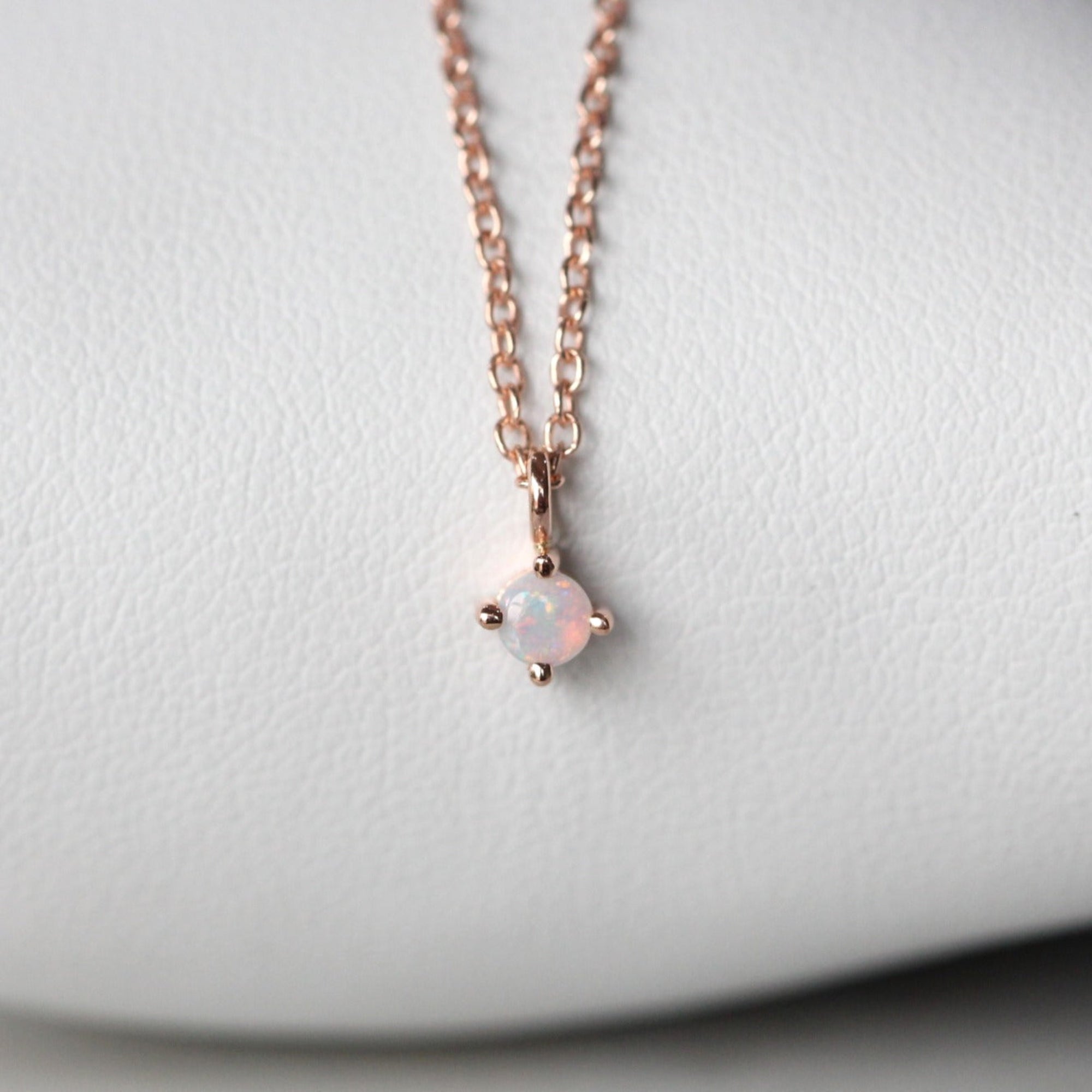 Petite opal necklace star set rose gold