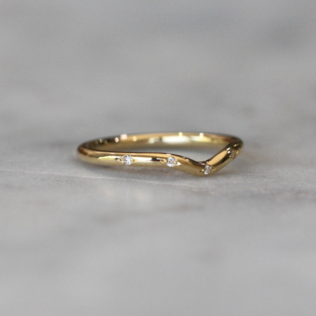 curved stardust diamond wedding band 