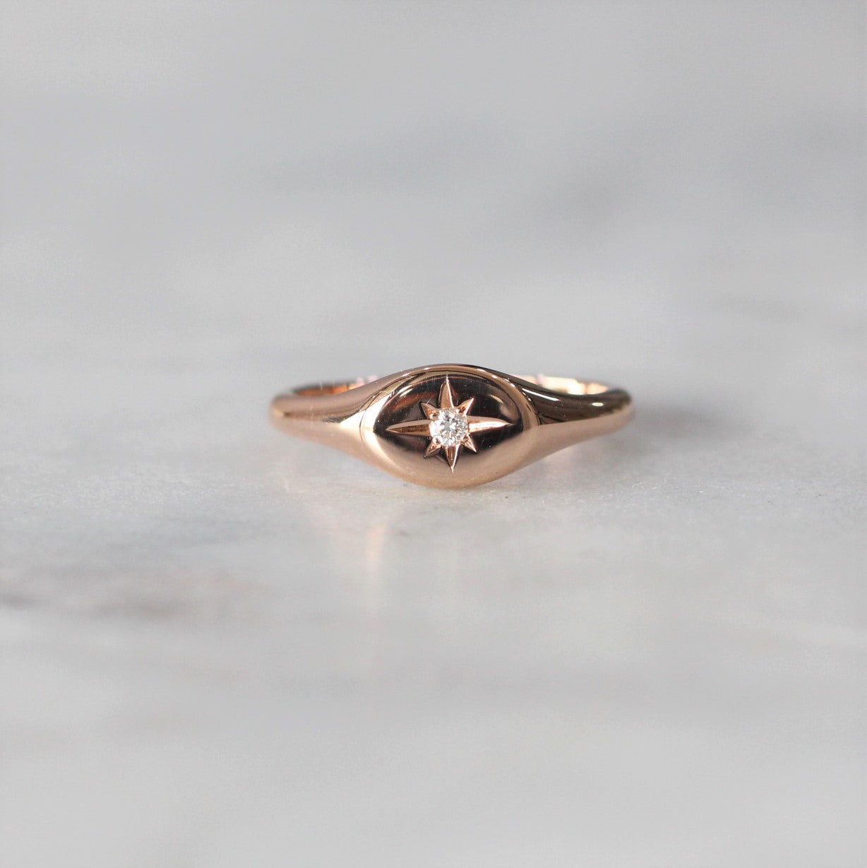 ellipse diamond signet ring