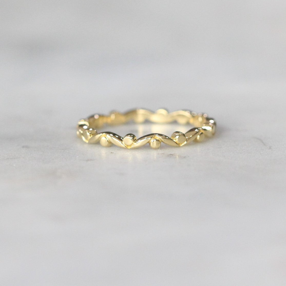 nature inspired gum leaf wedding band 