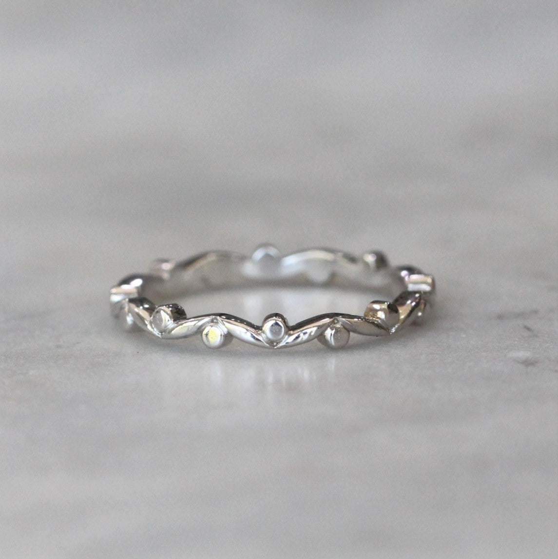 nature inspired gum leaf wedding band 