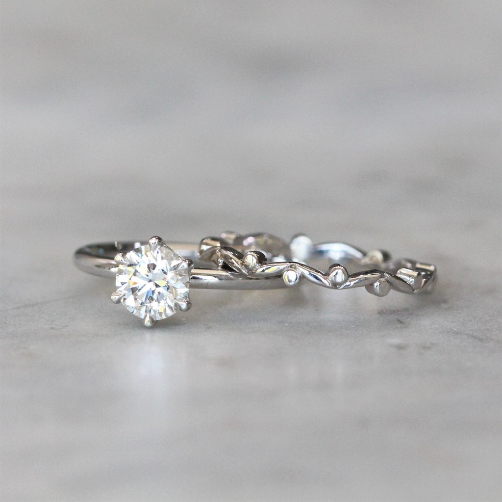 nature inspired gum leaf wedding band 