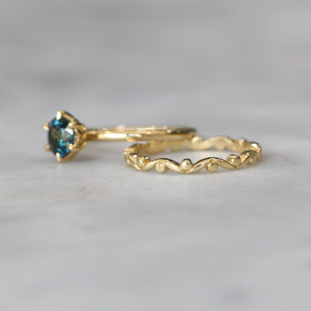 nature inspired gum leaf wedding band 