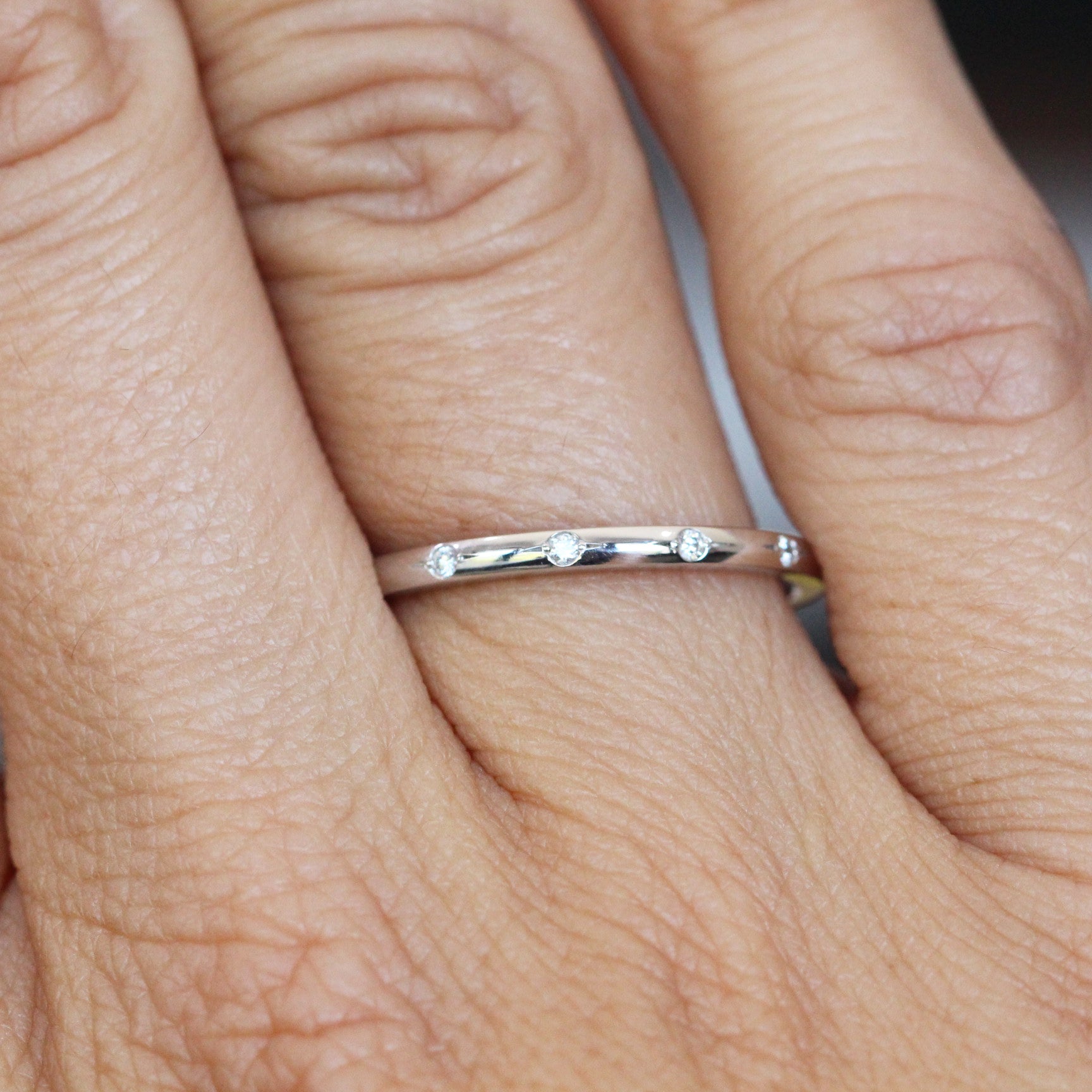 orbit diamond wedding band on hand