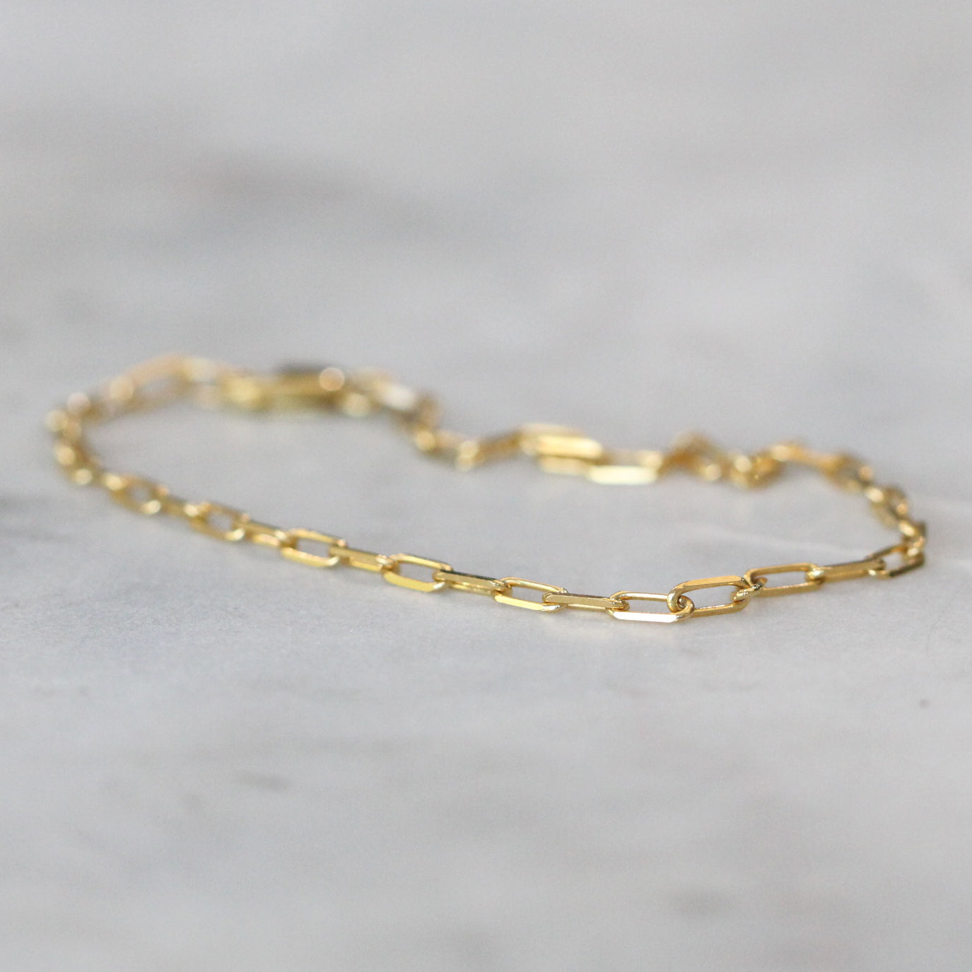 petite gold paperclip bracelet