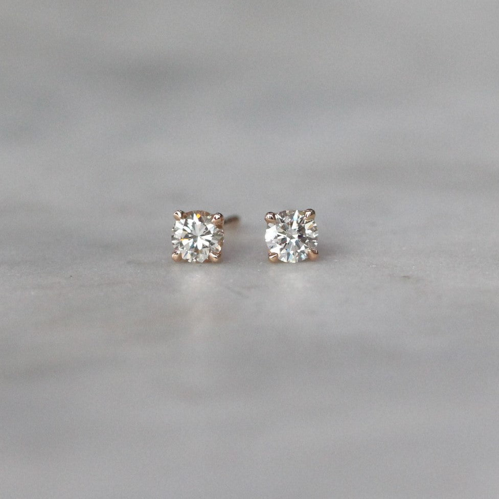 round cut White diamond stud earrings 