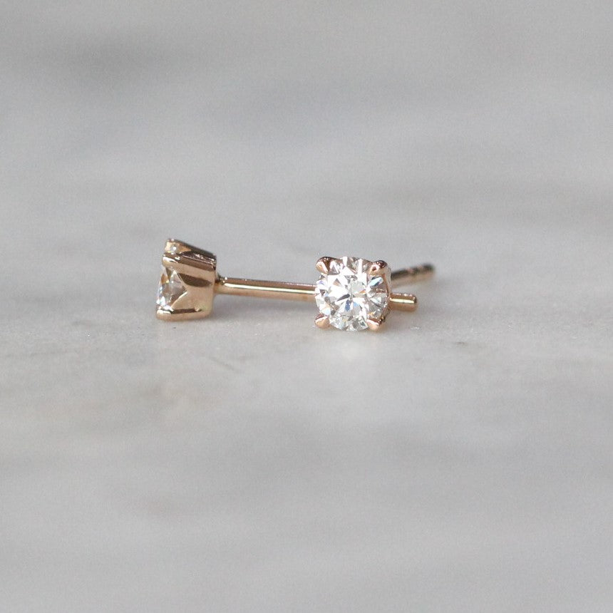round cut White diamond stud earrings 